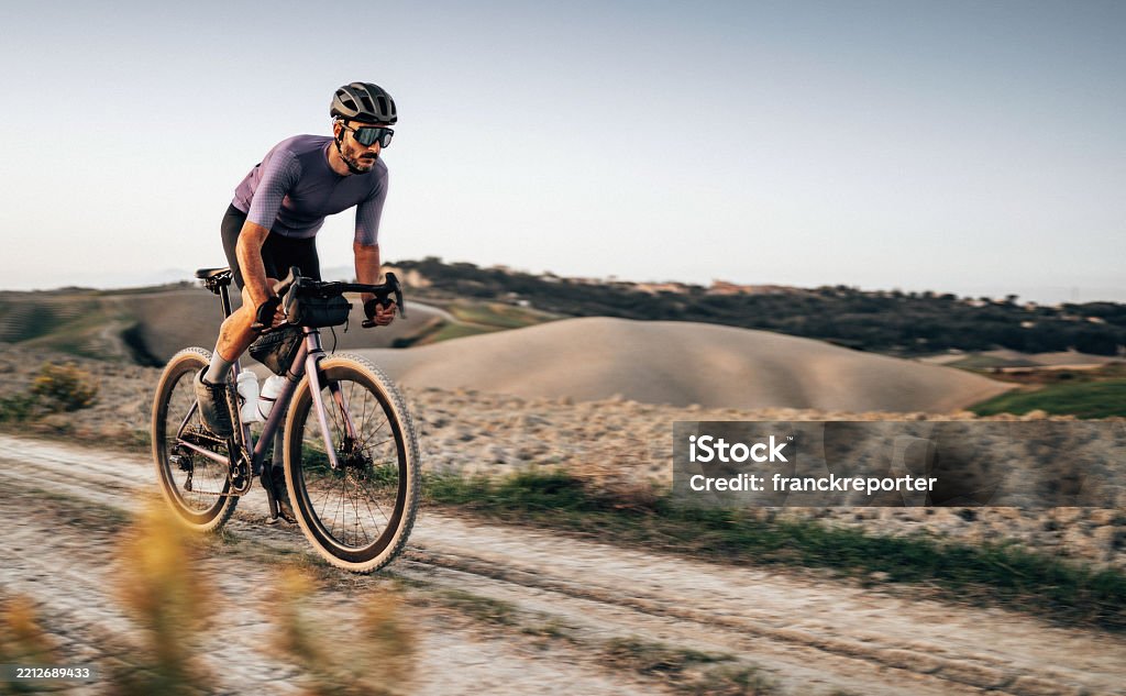sportive gravel cyclist on the countryside